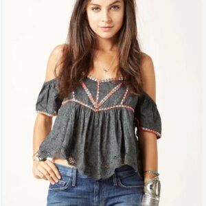 Grey off the shoulder Free People shirt.